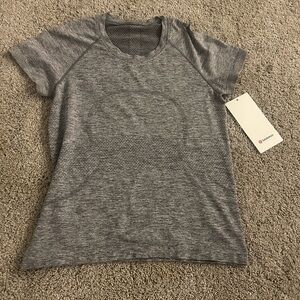 I am selling a swiftly tech short sleeve 2.0 and it’s brand new including tags.